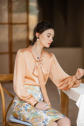 Chic Apricot Bow-Tie Blouse